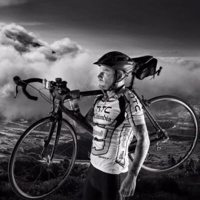 Matt Pritchard holding a bike - photo credit to Richard P Walton